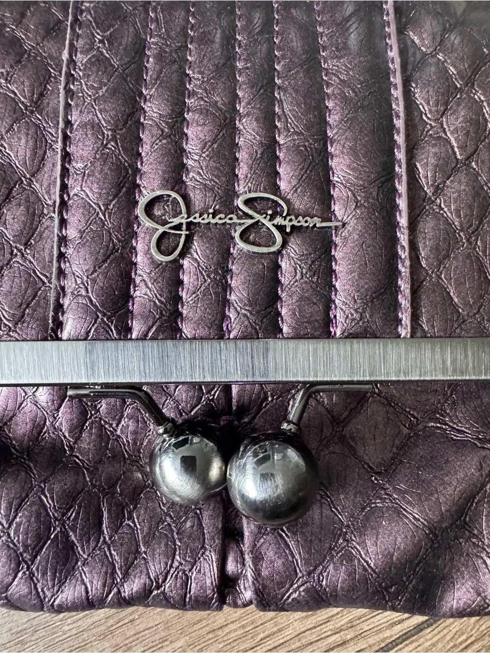 Jessica Simpson Metallic Plum Quilted Clutch with Frame Detail